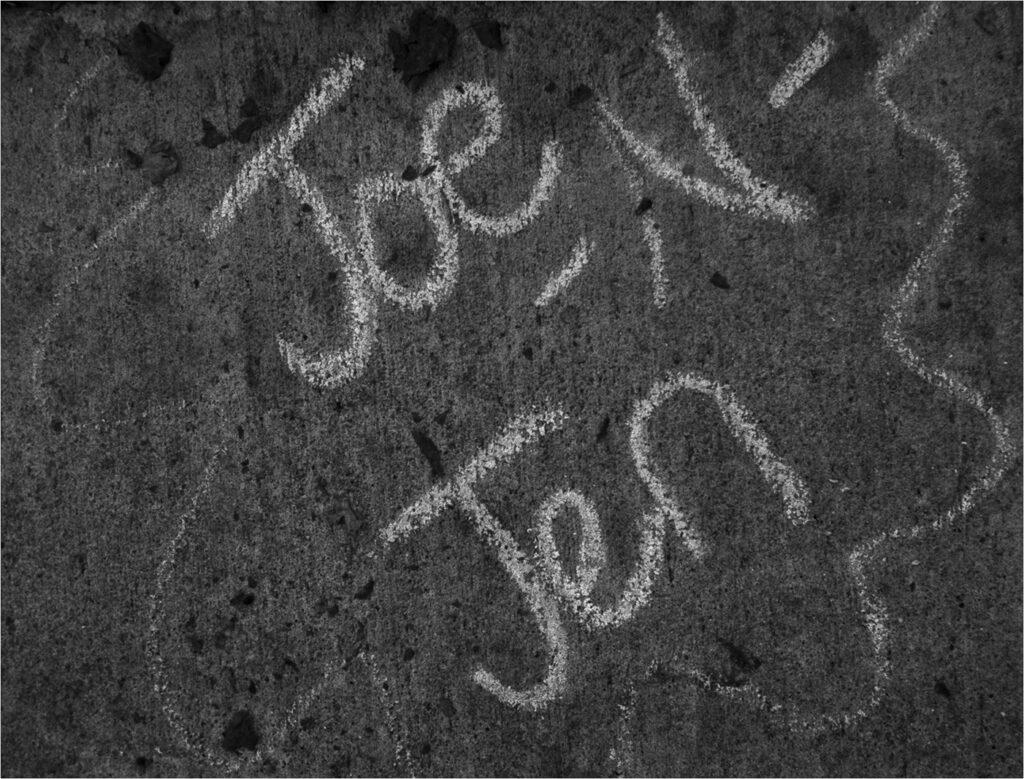 As Joe Calzada met with his father in the dads tow truck parked in front of Covenant House on the sons 21st birthday, Joes wife, Jennifer wrote this on the sidewalk with an acorn.